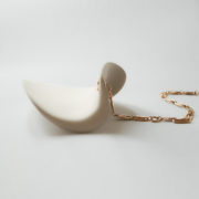 Oreja with partial chain side view